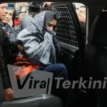 ditahan-kpk-bupati-pekalongan-tutupi-wajah-1772603089590_169