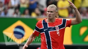 6a4ad8f92de8a-penyerang-norwegia-erling-haaland-usai-cetak-gol-kedua-ke-gawang-brasil-di-16-besar-piala-dunia-2026_gemini_1265_711